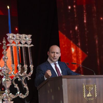 a05690267 Israeli Minister of Education, Naftali Bennet speaks in English and specifically to US Secretary of State John Kerry after lighting candles on a Menorah for the Jewish holiday of Hanukkah in Jerusalem, 28 December 2016. Bennet stressed the Jews have been lighting Hanukkah candles in Jerusalem for over 1800 years and called the UN Security Council resolution on Israel settlements 'shameful.' 