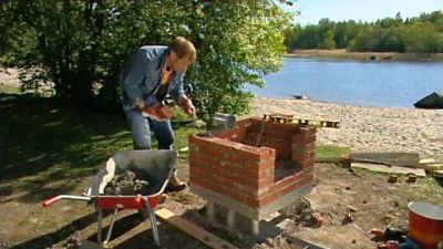 Multifunktionell utegrill till bastustranden
