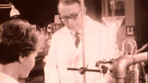 Professori A. I. Virtanen laboratoriossa apulaisensa kanssa.