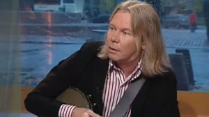 Muusikko Jukka Karjalainen Aamu-tv:ssä vuonna 2006.