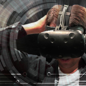 Graafisesti käsitelty kuva, jossa miehellä VR-lasit päässä