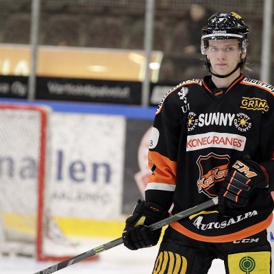 Mikko Virtanen KooKoon paidassa.