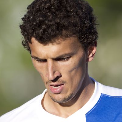 Roman Eremenko Suomen maajoukkuepaidassa.