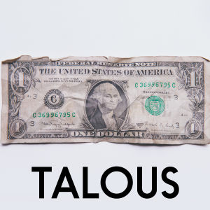 Battlen talouskokonaisuuden teemakuva. Kuvassa rypistynyt US dollarin seteli.
