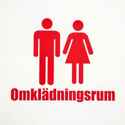 Logo med man och kvinna och texten omklädningsrum