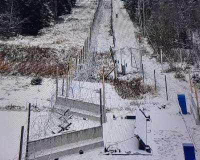 Temporary concrete and wire barriers on Finland's eastern border.