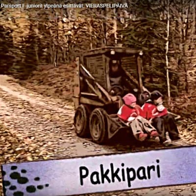 Skärmdump av ParSports video på Youtube, med två juniorer som sitter i skopan på en traktor.