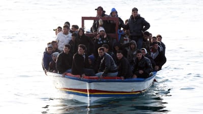 Flyktingar anländer till ön Lampedusa