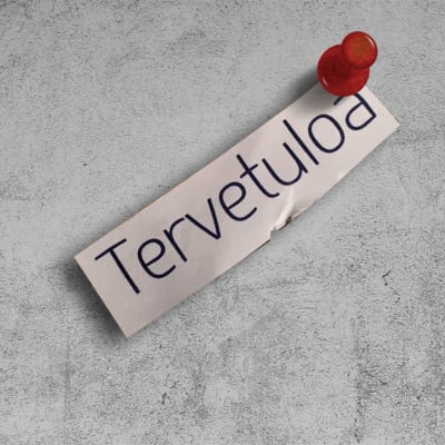 Muistilappu, jossa lukee: "Tervetuloa".