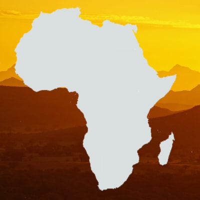 Kuvassa on Afrikan manner ja taustalla vaaleanruskea maisemakuva.