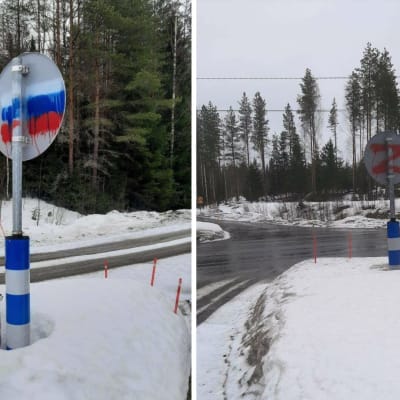 Liikennemerkin takapuolelle spray-maalilla maalattu Venäjän lippu.