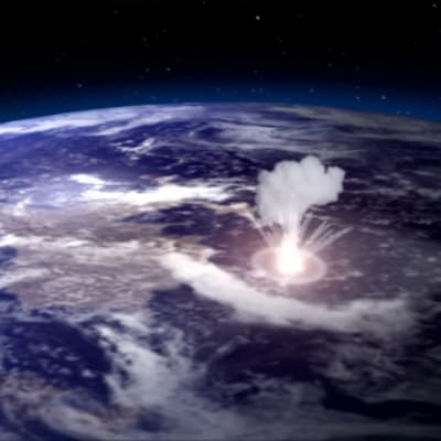 En meteorit slår ner på Jorden.