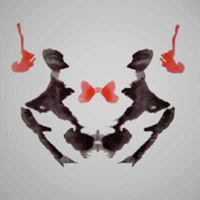 Bläckfläck ur Rorschachtest. Svarta och röda abstrakta figurer.