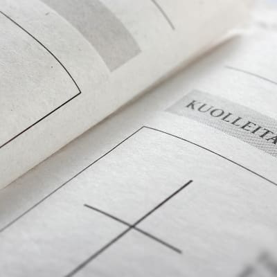 en dödsannons i en tidning