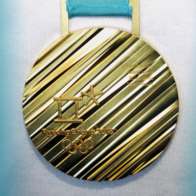 Iivo Niskasen kultamitali Pyeong Changin 50km hiihdosta.
