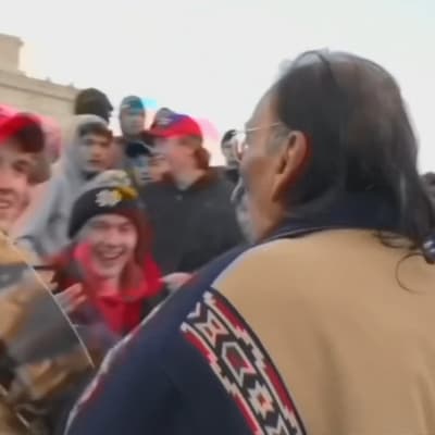Elever från en katolsk skola och en representant för USA:s ursprungsbefolkning i huvudstaden Washington den 18 januari 2019.