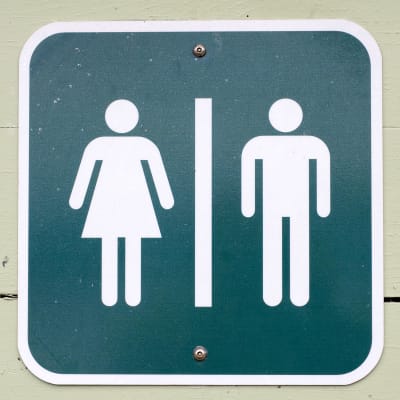vessan merkki jossa mies ja nainen