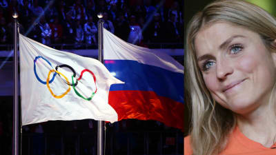 Therese Johaug med den ryska och olympiska flaggan.