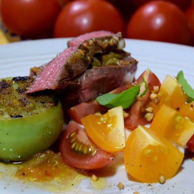 Portion med tomater och kött
