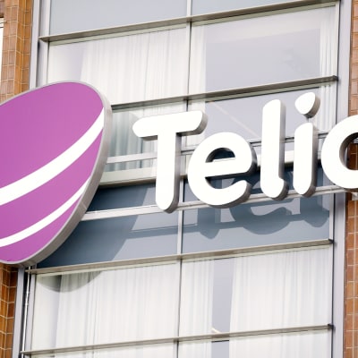 Telian logo talon seinässä.