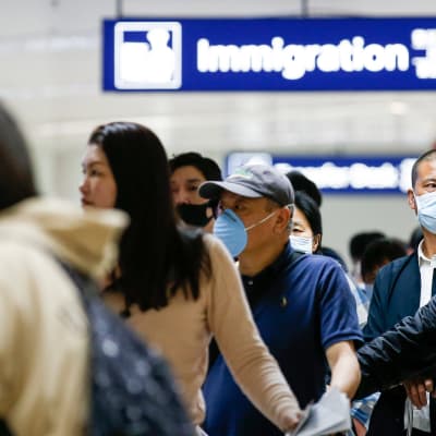 Matkustajia saapumassa Guangzhousta, Kiinasta  Ninoy Aquinon kansainväliselle lentokentälle 22. tammikuuta.