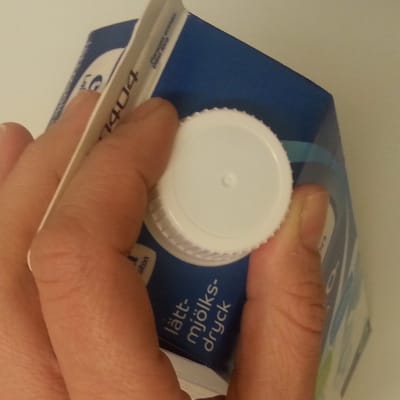 Mjölkförpackning med skruvkork