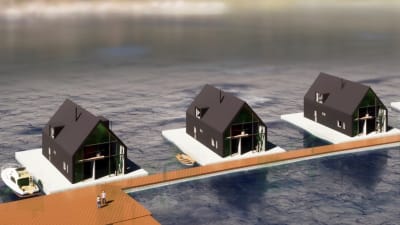 Skiss av tre grå flytande hus vid en brygga.