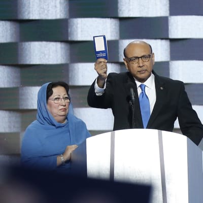 Khizr Khan (R), father of fallen soldier Human S. M. Khan, holds a copy of the United States Constitution on stage during final day of the Democratic National Convention at the Wells Fargo Center in Philadelphia, Pennsylvania, USA, 28 July 2016.