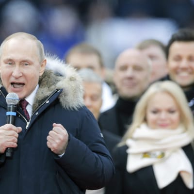 Presidentti Vladimir Putin on kampanjoinut vain harvakseltaan ennen vaaleja.