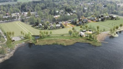 En flygbild över ett område vid vatten. På bilden har det ritats in skisser över hus och nya vägar.