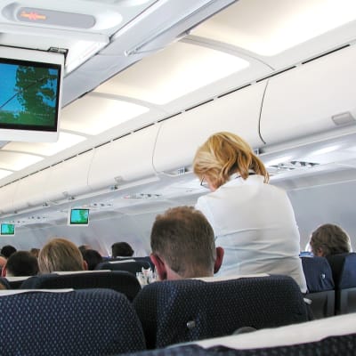 Passagerare i ett Finnairflygplan