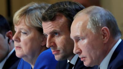 Tysklands Angela Merkel, Frankrikes Emmanuel Macron och Rysslands Vladimir Putin.