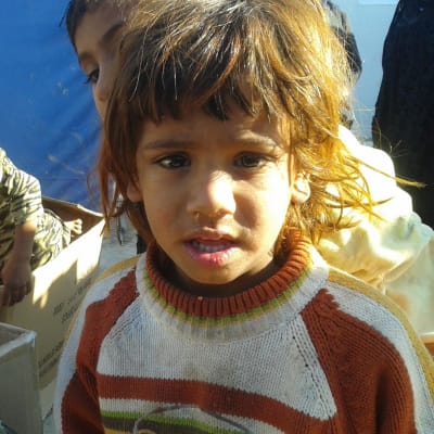 Barn i flyktinglägret Takiya, Irak, i december 2015