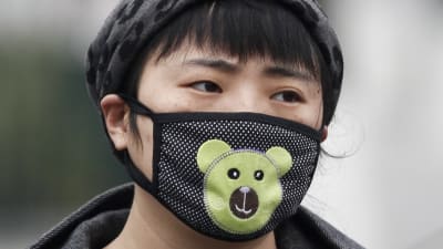 Kinesiska myndigheter i Beijing varnade för skadligt dålig luftkvalitet i mitten av november 2017.