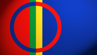 Samiska flaggan. Flaggans cirkel representerar solen (den röda halvan) och månen (den blå halvan).  Färger enligt traditionella klädesfärger.