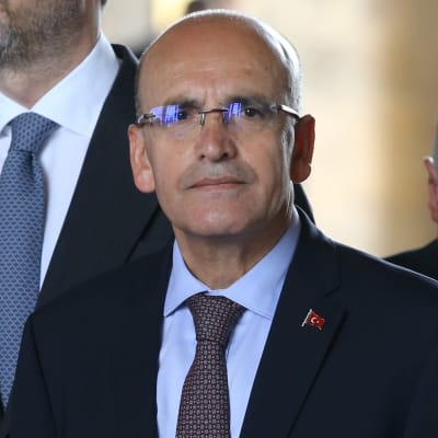 Porträtt på den turkiska finansministern Mehmet Simsek.