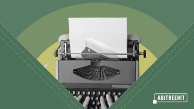vanhanaikaiseen kirjoituskoneeseen menee paperi, jossa ylioppilaslakki.