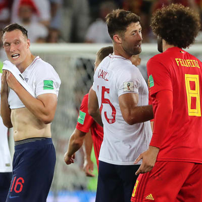 Danny Welbeck, Phil Jones, Gary Cahill och Marouane Fellaini efter gruppspelsmatchen England–Belgien.