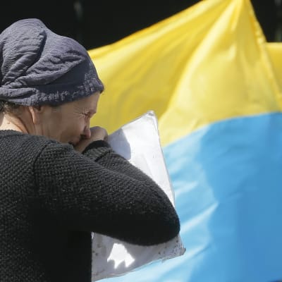 Ukrainsk kvinna på demonstration för ukrainskt-europeiskt samarbete i Kiev, Ukraina.