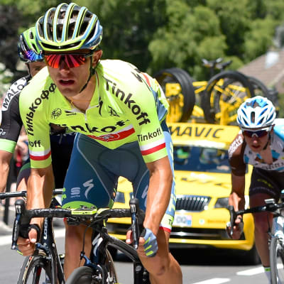 Tre landsvägscyklister under Tour de France.