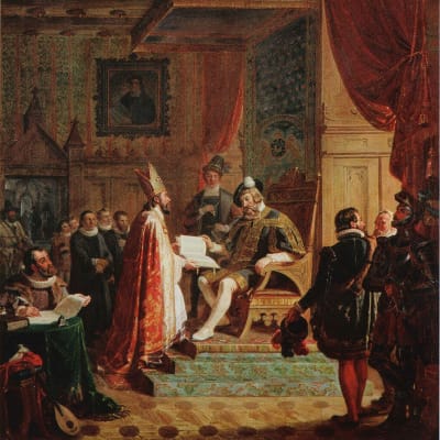 Mikael Agricola överlämnar Nya Testamentet till Gustav Vasa.
