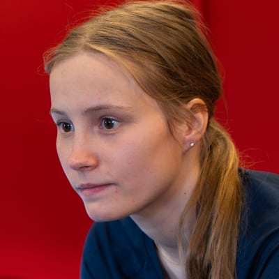Jenny Rautionaho sitter i gymmet.