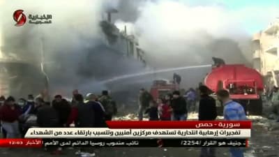 Skärmdump från den syriska tv-kanalen Al-Ikhbariya Al-Souriya visar attentatsplatsen i Homs 25.2.2017