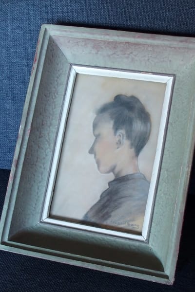 Kvinnoporträtt av konstnären Thyra Strandberg.