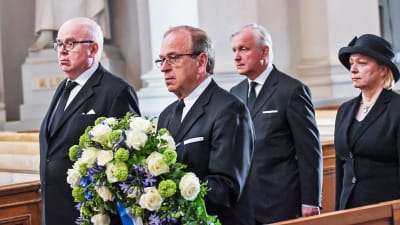 Chefdirektör Erkki Liikanen, bankdirektör Seppo Honkapohja och direktionsmedlemmarna Olli Rehn och Merja Nykänen representerade Finlands Bank vid Mauno Koivistos begravning den 25 maj 2017.