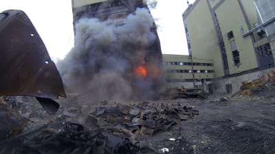 Ett hus som välter.