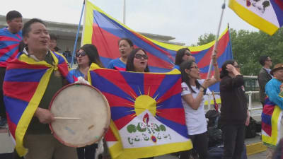 Tibetanska fans på läktaren