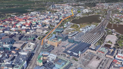 Google Earth ilmakuva Helsingin yltä, jossa remonttialue piireety Mannerheimintielle välille Postikatu - Reijolankatu.