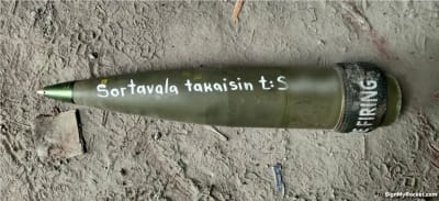 En granat med texten "Sortavala takaisin", ge Sortavala tillbaka.