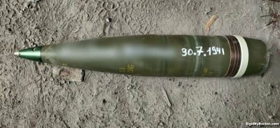 En granat med ett blurrat namn och datumet 30.7.1941.